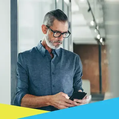 image of man on his phone image of man on his phone